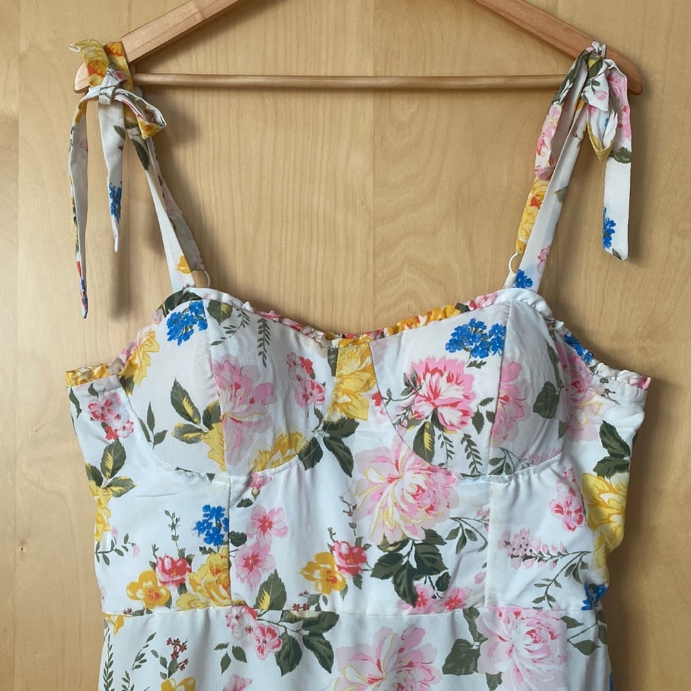 Floral summer dress, goes past the knees.